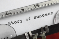 Story of success written on an old typewriter