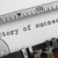 Story of success written on an old typewriter